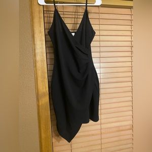 Black mini cocktail dress. Worn once. In perfect condition